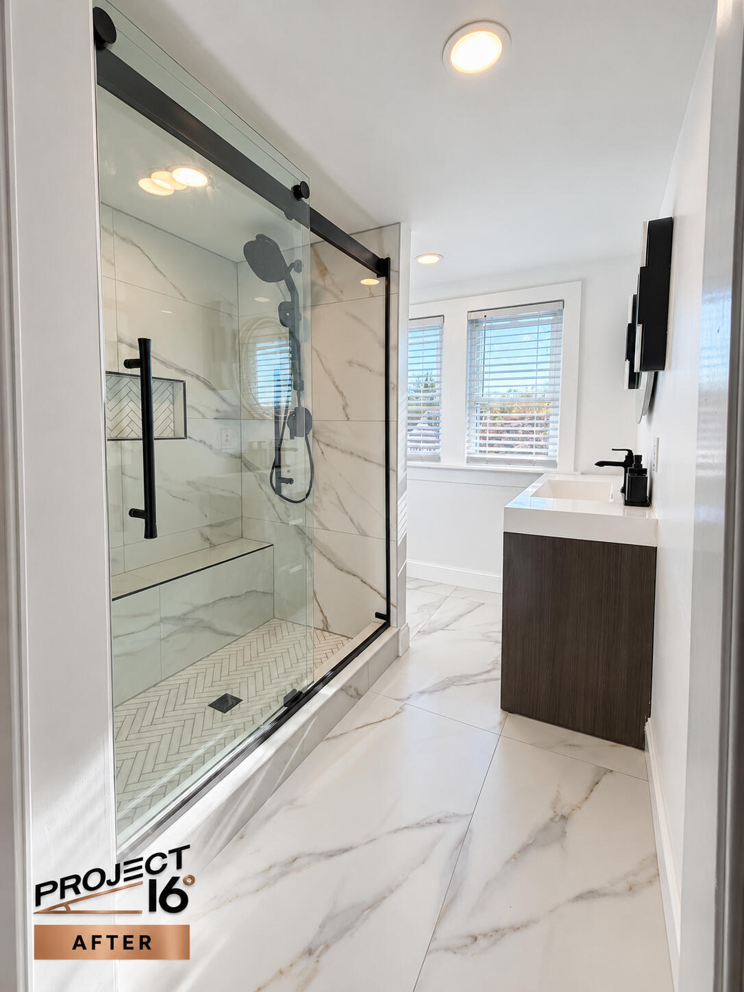 Project 16 bathroom renovation with tile shower and wood vanity
